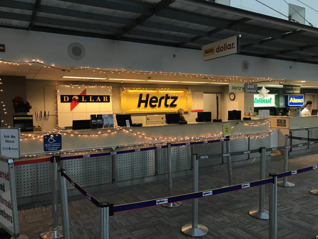 hertz and dollar car rental counters at airport