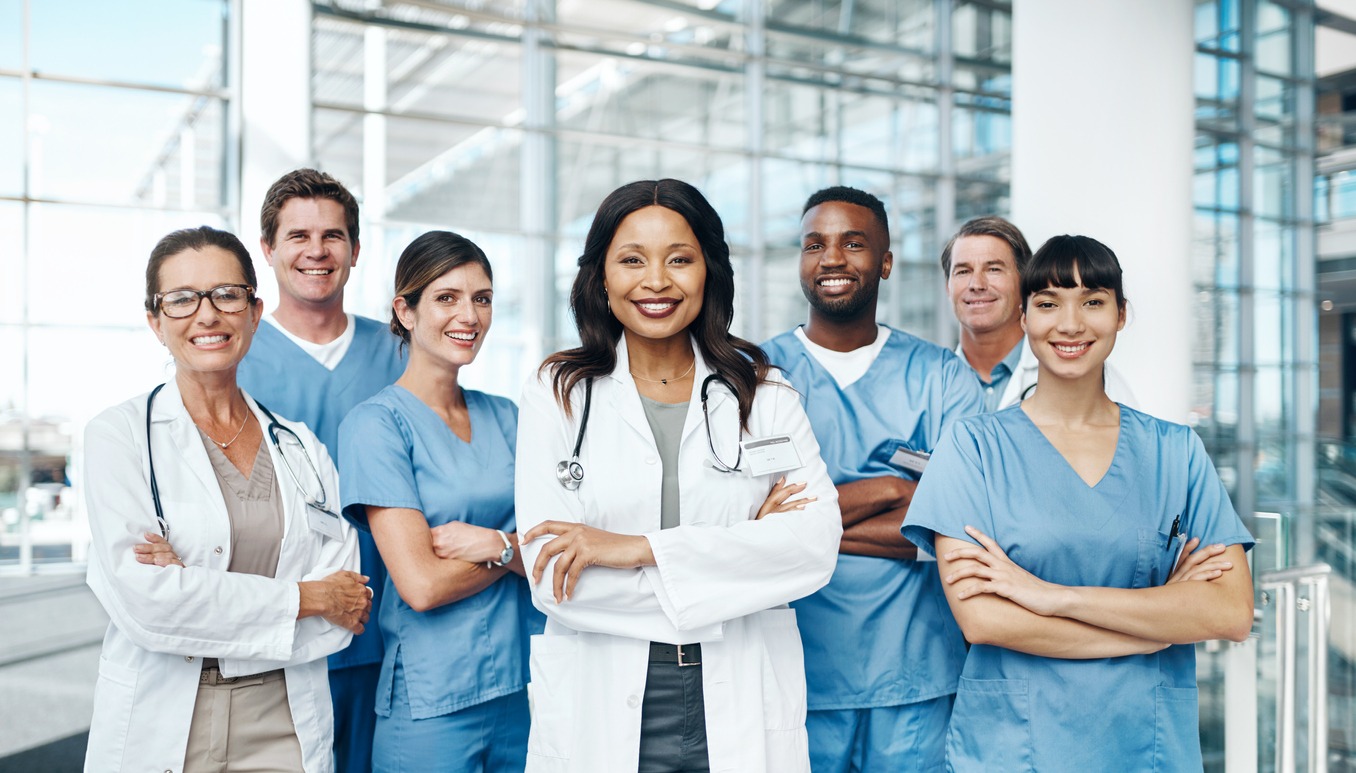 Portrait of a group of medical practitioners standing together in a hospital