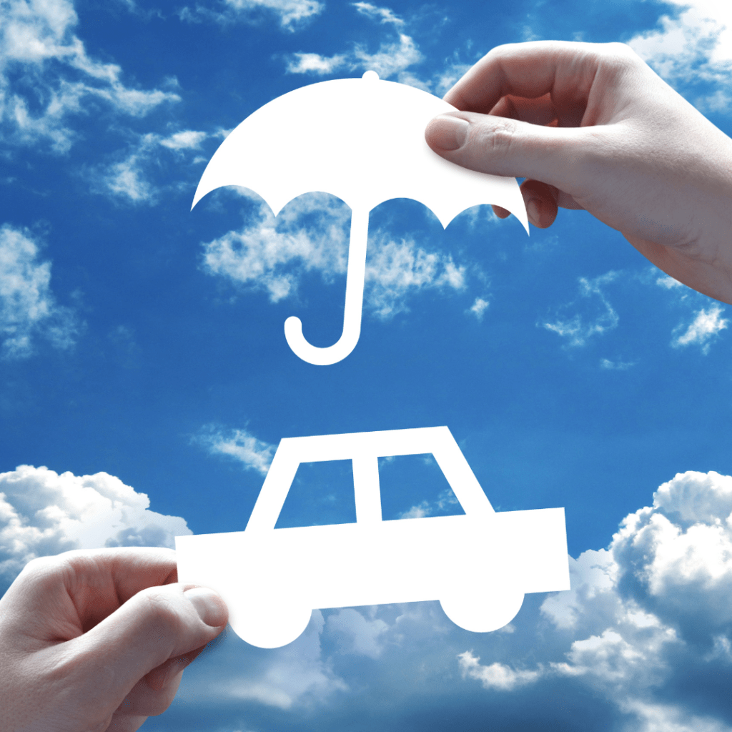 a cutout of an umbrella and a car representing the protection of car rental insurance