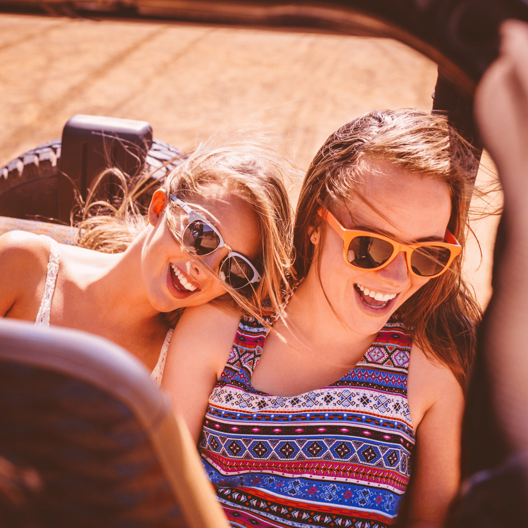 people in a car on a labor day road trip