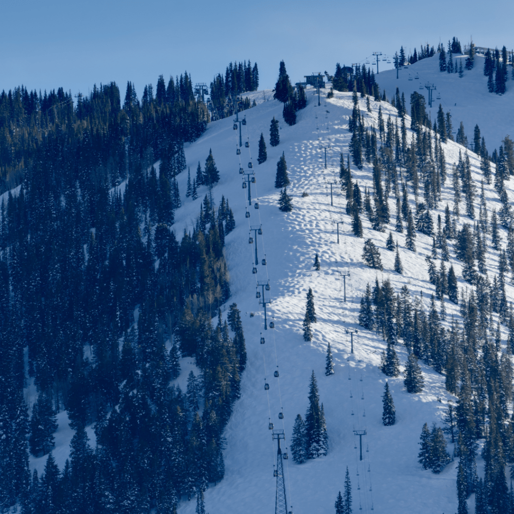 a ski lift in Aspen, Colorado representing the top winter road trip destinations