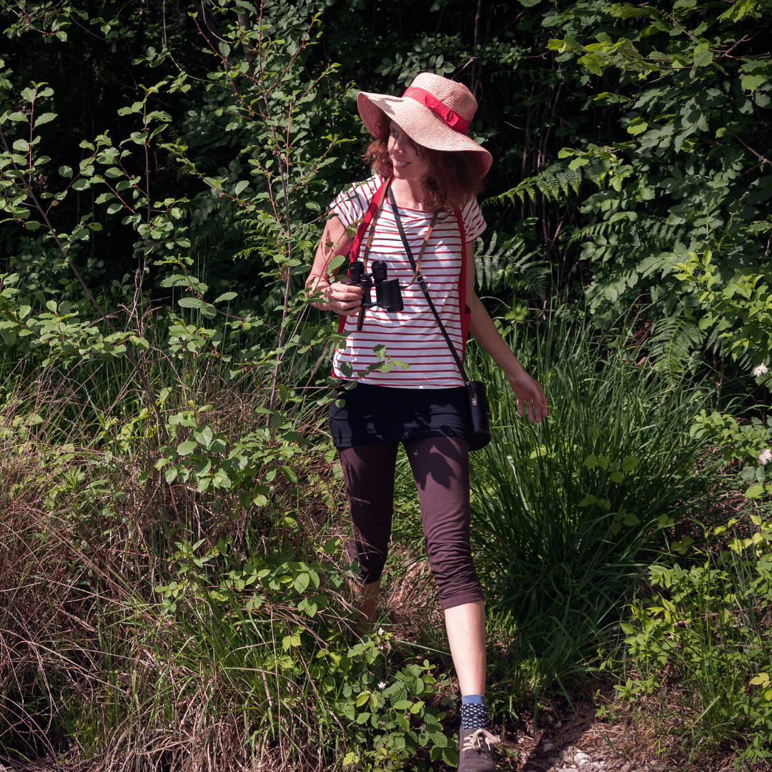 a woman exploring off the beaten track on her road trip