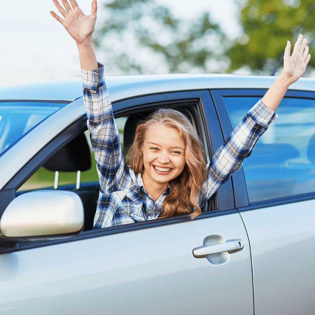 happy person in rental car